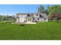 Expansive backyard with a gazebo, patio, and mature trees at 3880 Dial Mill Ne Rd, Conyers, GA 30013