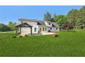 Spacious backyard featuring a patio, gazebo, and fenced perimeter at 3880 Dial Mill Ne Rd, Conyers, GA 30013