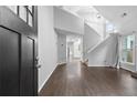 Bright entryway featuring soaring ceilings, hardwood floors, and a staircase to the upper level at 969 Oak Sw St, Atlanta, GA 30310