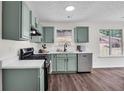 Updated kitchen featuring stainless steel appliances and bright countertops at 1075 Litchfield Sw Way, Marietta, GA 30060
