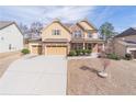 Lovely home featuring a three-car garage, manicured lawn, and inviting curb appeal at 965 Mulberry Bay Dr, Dacula, GA 30019
