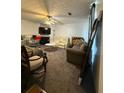 Bright living room features modern furniture, a fireplace, and a television for entertainment at 5047 Chupp Way Cir, Lithonia, GA 30038