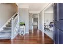 Elegant foyer features hardwood floors, a staircase, and neutral paint, creating a welcoming entrance at 1463 Shadowrock Hts, Marietta, GA 30062