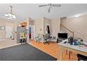 Spacious living area with hardwood floors and a view of the staircase, great for Gathering gatherings at 2171 Wilson Nw Ave, Atlanta, GA 30314