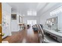 Bright dining room with hardwood floors and modern chandelier, perfect for Gathering meals at 2865 Lenox Ne Rd # 211, Atlanta, GA 30324