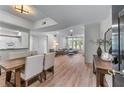 Open-concept living and dining area with hardwood floors and abundant natural light at 3636 Habersham Nw Rd # 2101, Atlanta, GA 30305