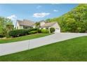 Lovely home with well-maintained lawn, a long driveway, and attached garage at 4740 Union Hill Rd, Canton, GA 30115