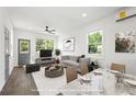 Bright living room with modern furniture, hardwood floors and abundant natural light at 585 Ira Sw St, Atlanta, GA 30312
