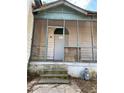 Close-up view of the front porch featuring decorative trim and steps leading to the entry door at 701 Garibaldi St, Atlanta, GA 30310