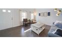 Bright living room featuring hardwood floors, neutral paint, and modern furnishings for a welcoming atmosphere at 3985 Starwood Dr, Cumming, GA 30028