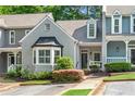 Charming townhome with well-maintained landscaping and inviting curb appeal at 404 Carryback Dr, Marietta, GA 30068
