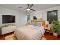 Inviting bedroom boasts hardwood floors, a ceiling fan, and abundant natural light at 120 Alden Nw Ave # C3, Atlanta, GA 30309