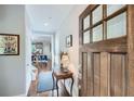 Bright foyer with hardwood floors, fresh paint, and an inviting view into the modern kitchen at 2686 Oak Leaf Se Pl, Atlanta, GA 30316