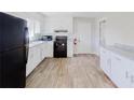 A well-lit kitchen features modern appliances, sleek countertops, and ample cabinet space at 8451 Magnolia Dr, Jonesboro, GA 30238