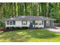 Charming home with well-manicured lawn and mature trees at 1585 San Gabriel Ave, Decatur, GA 30032