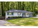Charming home with well-manicured lawn and mature trees at 1585 San Gabriel Ave, Decatur, GA 30032