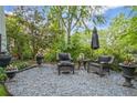 Cozy outdoor seating area with comfortable chairs and lush greenery at 908 N Highland Ne Ave, Atlanta, GA 30306