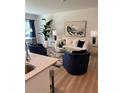 Cozy living room featuring stylish decor, comfortable seating, and ample natural light at 1569 Aiden Way # 35, Conyers, GA 30013