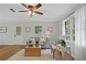 Bright living room featuring a large window, hardwood floors and neutral paint at 4781 Lincoln Ne Dr, Kennesaw, GA 30144
