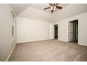Spacious main bedroom featuring vaulted ceilings and plush carpeting at 4530 Talon Way, Douglasville, GA 30135