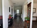 Inviting entryway showcasing hardwood floors, neutral walls, and decorative furnishings at 3531 Lilly Brook Dr, Loganville, GA 30052