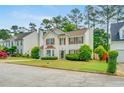 Charming two-story home with landscaped yard and inviting curb appeal on a sunny day at 3550 Willow Tree Trce, Decatur, GA 30034