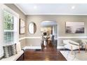 Bright living room featuring hardwood floors and neutral paint at 949 Hope Sw Dr, Atlanta, GA 30310