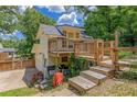 Wood decks, stairs, and a fenced-in yard complete this backyard with plenty of room for entertaining at 315 Renae, Marietta, GA 30060