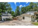 A two-car detached garage is connected to the main house by a portico, offering covered parking at 315 Renae, Marietta, GA 30060