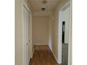 Bright hallway with closet and neutral paint, providing access to various rooms in the home at 417 Ohern Ct, Stone Mountain, GA 30088