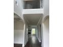 Bright entryway with soaring ceilings, dark hardwood floors, and white trim at 129 Silvercrest Dr, Acworth, GA 30101