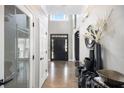 Bright and spacious foyer with hardwood floors and stylish decor at 507 Southshore Ln, Dallas, GA 30157