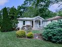 Inviting home with charming details and lush greenery at 2660 Birch Se St, Smyrna, GA 30080