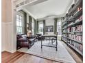 Bright office space featuring hardwood floors, custom shelving, and an abundance of natural light at 1110 Parkview Se Pl, Smyrna, GA 30080
