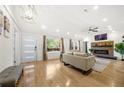 Bright living room features hardwood flooring, fireplace, and lots of natural light at 2710 Hedgewood Nw Dr, Atlanta, GA 30311