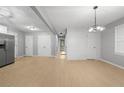 Spacious living area with modern lighting, sleek flooring, and ample natural light, perfect for entertaining at 2917 Reveille Se Cir, Atlanta, GA 30316