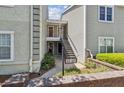 Townhouse exterior featuring private entrances and well-maintained landscaping at 66 Devon Ln, Avondale Estates, GA 30002