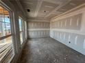 Spacious living room with lots of natural light and new drywall for a modern feel at 2076 Boxwood Circle Se, Conyers, GA 30094