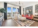 Cozy living room features large windows, hardwood floors, and modern decor at 128 Bert Lane Se # 167, Atlanta, GA 30316
