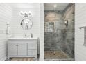 Modern bathroom with tiled shower and updated vanity at 2410 Bankstone Sw Dr, Marietta, GA 30064