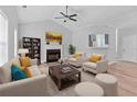 Bright living room with vaulted ceilings, a cozy fireplace, and neutral decor at 3315 Brookfield Dr, Austell, GA 30106