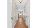 Inviting entryway with wood-look flooring and neutral paint, leading into a spacious living area with natural light at 6292 Field Glen Rd, Stone Mountain, GA 30087