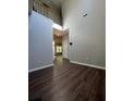 Bright foyer with hardwood floors, high ceilings, and a view to the living area at 3063 Grace Ct, Lawrenceville, GA 30043