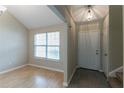 Inviting entryway featuring modern lighting and clean design at 4870 Heather Mill Trce, Snellville, GA 30039