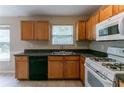 Well-lit kitchen with practical appliances and ample counter space at 4870 Heather Mill Trce, Snellville, GA 30039
