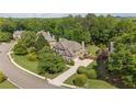 Aerial view of a home, showcasing its landscaped yard and neighborhood at 1440 Water View Ln, Suwanee, GA 30024