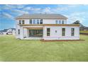 Expansive backyard featuring a covered patio perfect for outdoor entertaining at 2505 Kirkwood Dr, Cumming, GA 30041