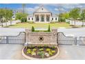 Beautiful community center with manicured lawns and inviting entrance, creating a welcoming neighborhood ambiance at 10200 Windalier Way, Roswell, GA 30076