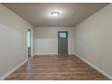 Bright living room featuring modern flooring and a fresh, neutral color palette at 3140 Delowe Dr, Atlanta, GA 30344