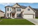 Charming two-story brick home with a well-manicured lawn and attached two-car garage at 5180 Mirror Lake Dr, Cumming, GA 30028